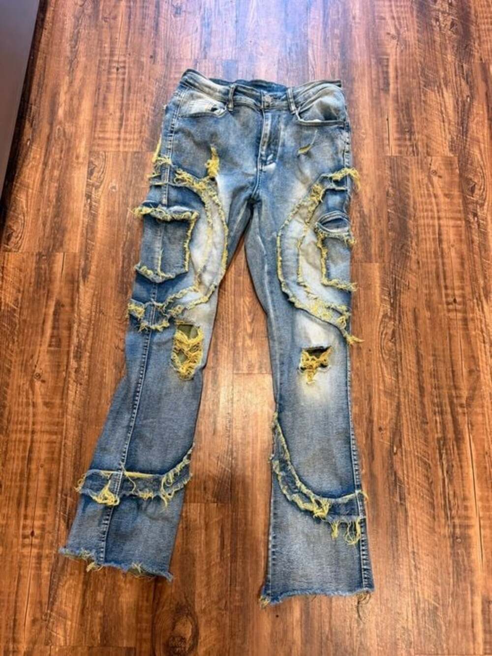 Men's Distressed Blue Denim Jeans with Yellow Frayed Accents